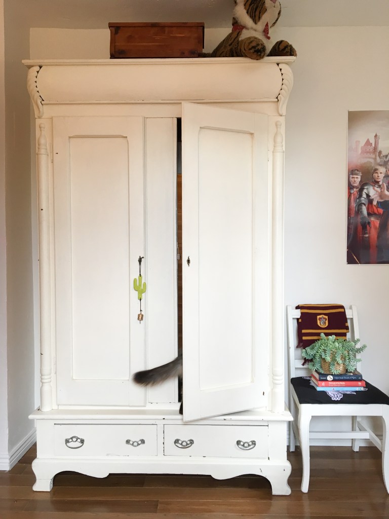 armoire with hidden room behind